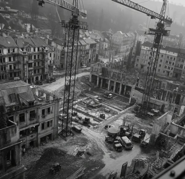 Photo illustrant une reconstruction de quartier d'une ville suite aux destructions occasionnées par la deuxième guerre mondiale